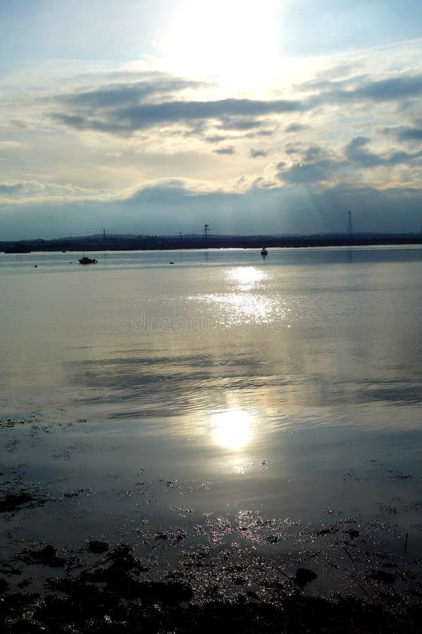 Sun Reflecting on the Sea stock image. Image of clouds - 164217513