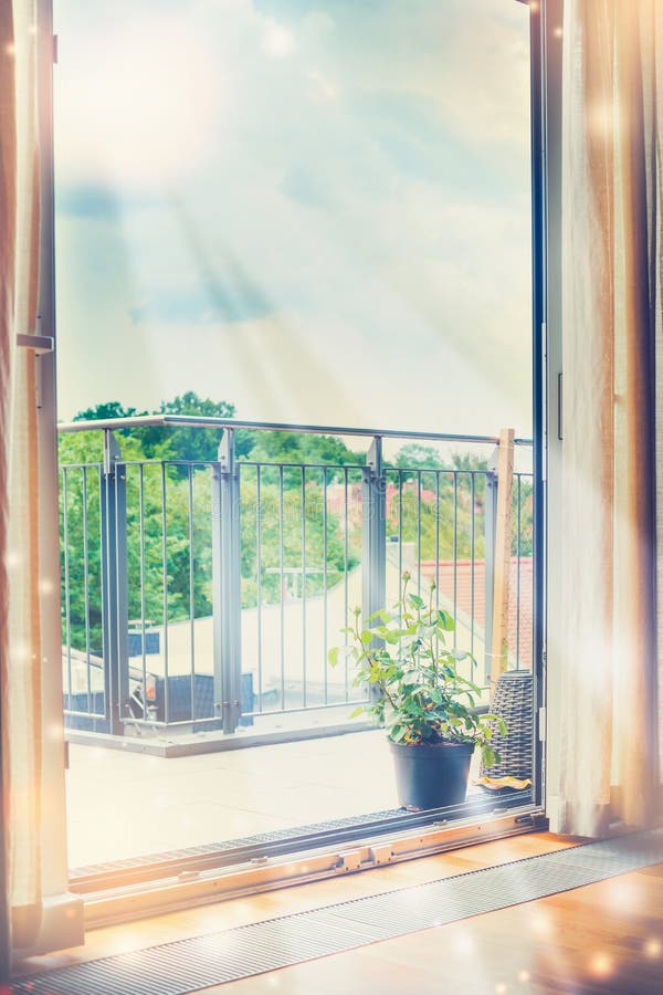 Sun's rays shine into the room through an open window stock photos Sun's rays shine into the room through an open window stock photos