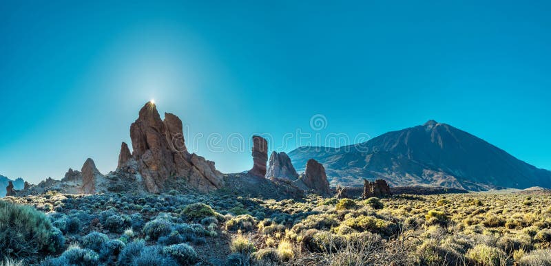 Sun is setting over Roques de GarcÃ­a and Roque Cinchado. Unique landscape of Teide National Park Tenerife Island