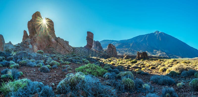 Sun is setting over Roques de GarcÃ­a and Roque Cinchado. Unique landscape of Teide National Park Tenerife Island