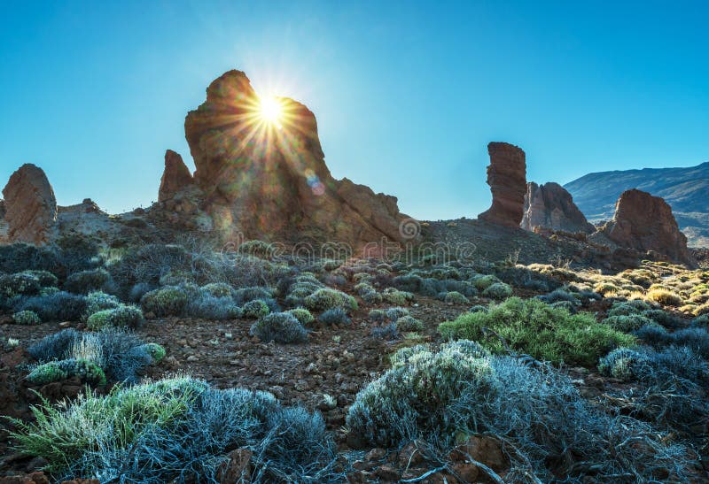 Sun is setting over Roques de GarcÃ­a and Roque Cinchado. Unique landscape of Teide National Park Tenerife Island