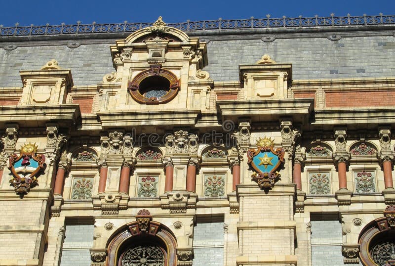 Sun symbol on Palacio de Aguas Corrientes in Buenos Aires, The Water Company Palace. The Palace of Flowing Waters an architecturally significant water pumping station in Buenos Aires, Argentina. Symbols of the sun on the walls. Sun symbol on Palacio de Aguas Corrientes in Buenos Aires, The Water Company Palace. The Palace of Flowing Waters an architecturally significant water pumping station in Buenos Aires, Argentina. Symbols of the sun on the walls