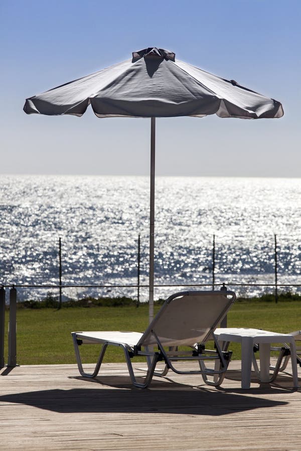 Sun Umbrella and Chairs Near a Pool Stock Photo Image of decoration, relax 28047516