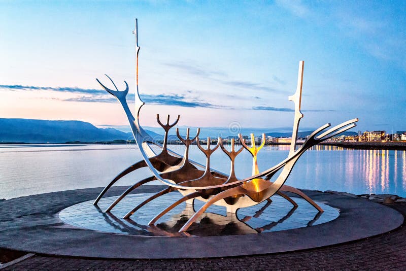 Sun Voyager sculpture in Reykjavik, Iceland, at midnight in summertime. Sun Voyager sculpture in Reykjavik, Iceland, at midnight in summertime.