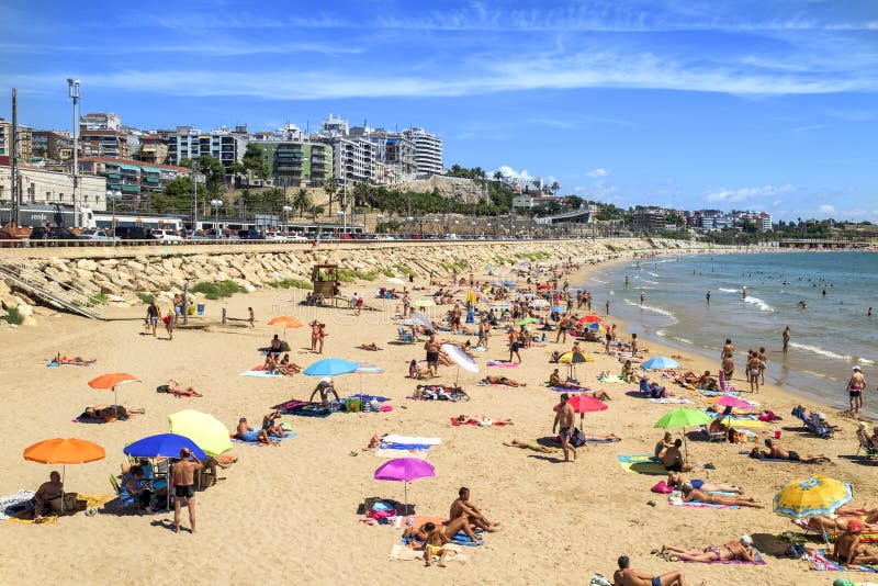Sunbathers At Miracle Beach In Tarragona, Spain Editorial Photo Image