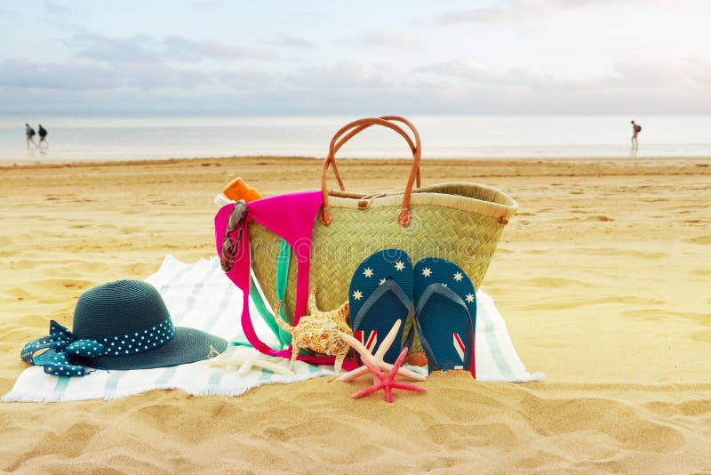 Sunbathing Accessories on Sandy Beach Stock Image - Image of accessory ...