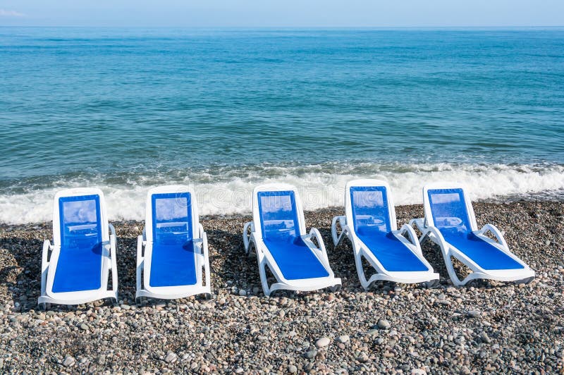 Sunbathing Blue Beds on the Beach Stock Image Image of recreation