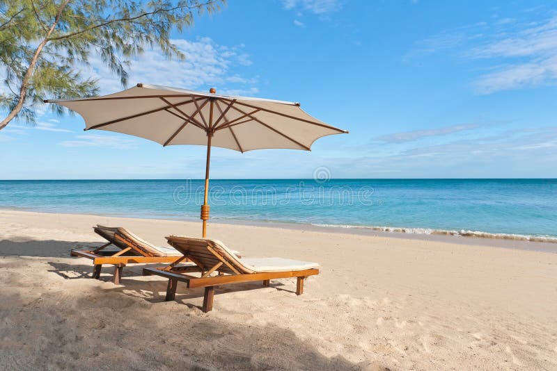 Sunbeds on the beach stock image. Image of coast, beautiful 113876415