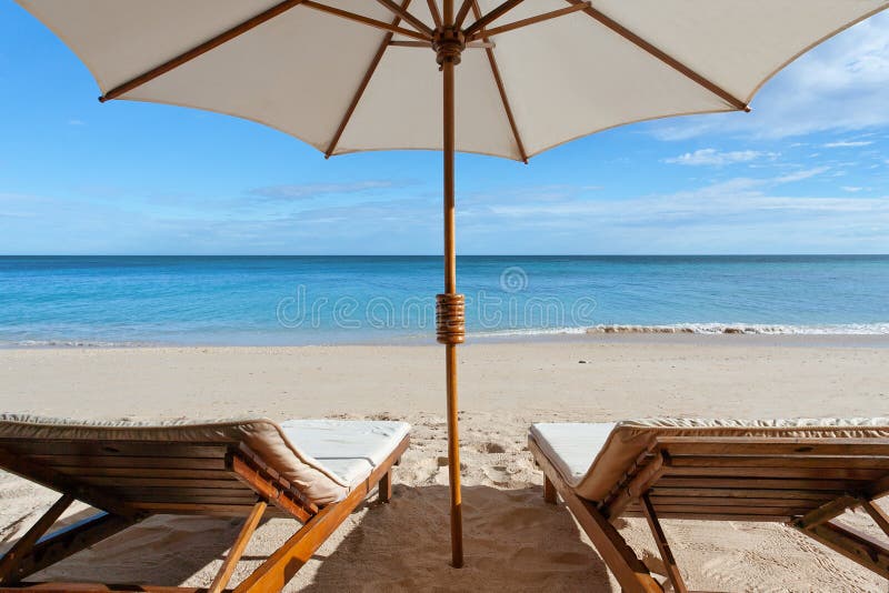 Sunbeds on the beach stock photo. Image of summer, romantic 113876328