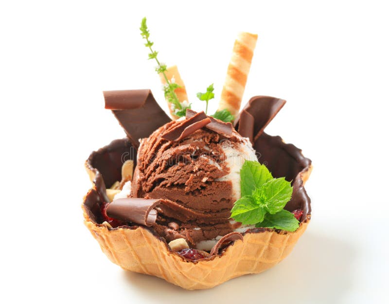 Chocolate vanilla Ice cream served in waffle basket. Chocolate vanilla Ice cream served in waffle basket