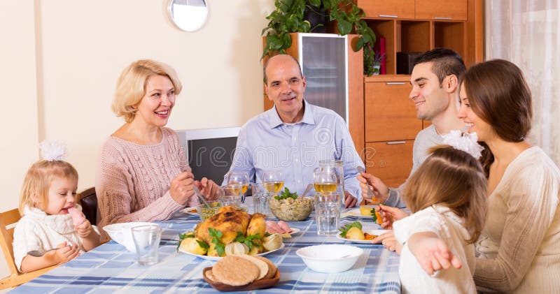 Sunday dinner of family stock image. Image of father - 58937449