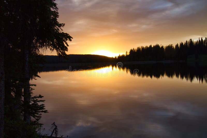 Sundown at Big Creek Lake. Big Creek Lake at the campground. Grand Mesa in Western Colorado, is known as the world’s largest flat top mountain. Over 10,000 royalty free stock image Sundown at Big Creek Lake. Big Creek Lake at the campground. Grand Mesa in Western Colorado, is known as the world’s largest flat top mountain. Over 10,000 royalty free stock image