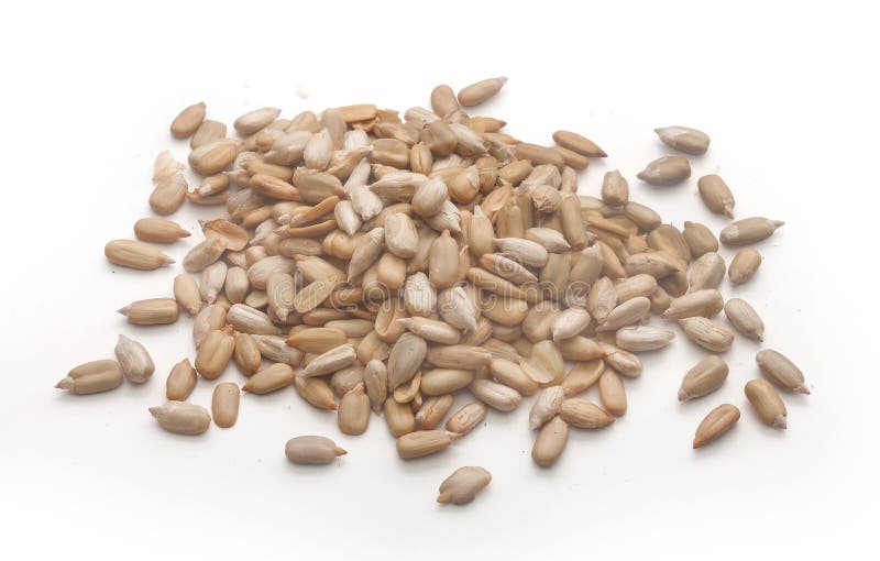 Isolated handful of sunflower's seeds without shell on the white background