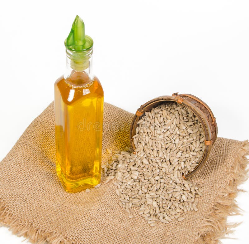 Sunflower seeds and oil stock photo. Image of food, ingredient 141525720