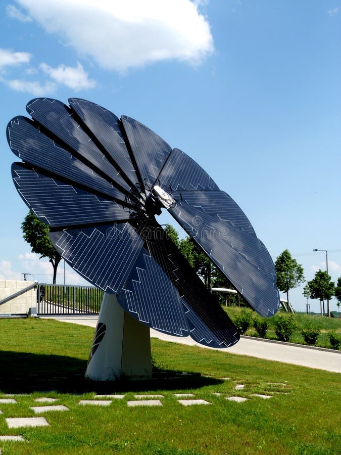 Sunflower shaped solar panel detail under blue sky stock image Sunflower shaped solar panel detail under blue sky stock image