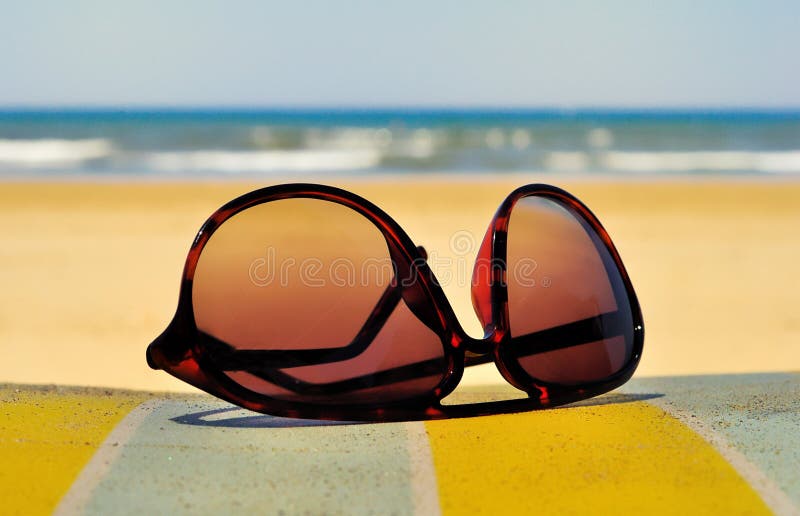 Beach and Sunglasses stock photo. Image of glasses, holidays 19847488