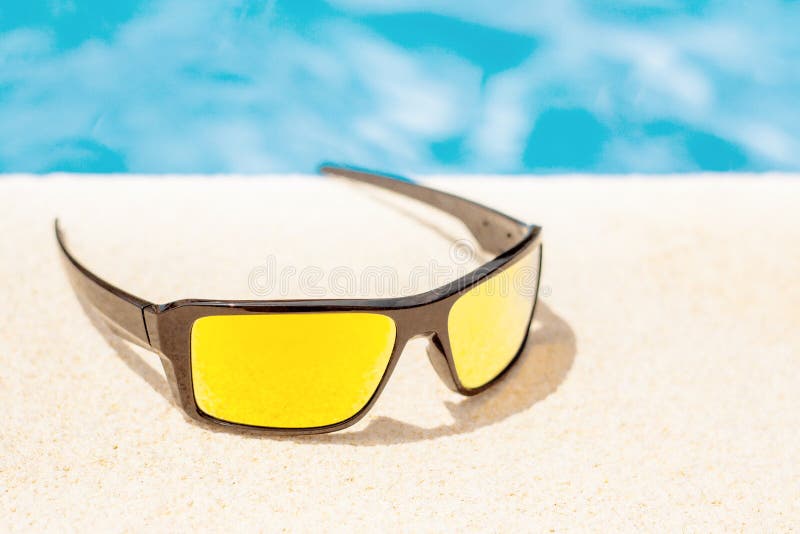 Sunglasses at the Edge of Pool Stock Image Image of sunlight