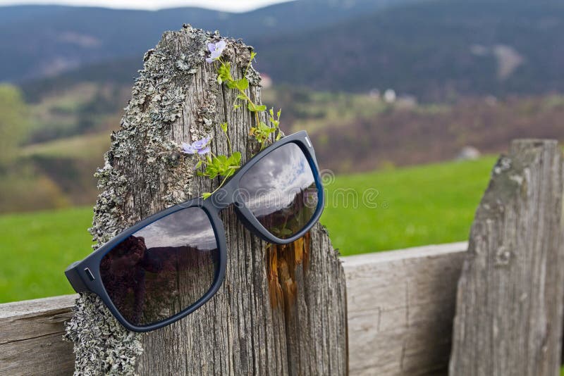 Sunglasses Hang on an Old Fence Stock Photo Image of hang, closeup