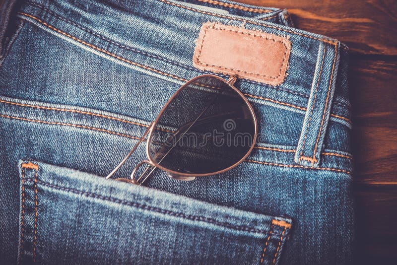 Sunglasses In A Jeans Pocket Stock Photo, Picture and Royalty Free Image.  Image 105485921.
