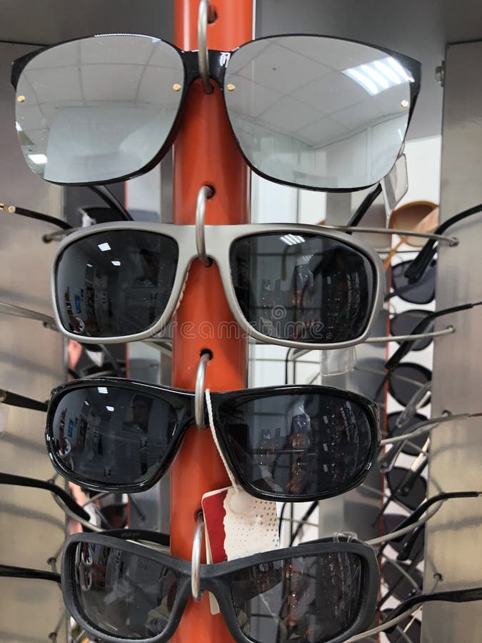 Sunglasses on a Shop Window, Contemporary and Trendy Stock Image