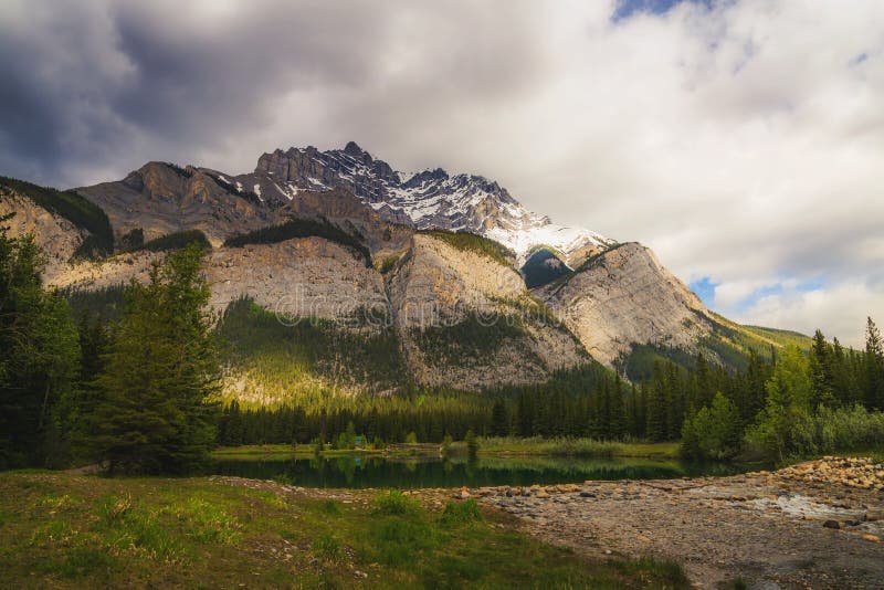 Sunlit Clouds Over Mountains at Cascade Ponds Stock Photo - Image of ...