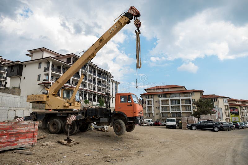 SUNNY BEACH, BULGARIA - MAY 16, 2017: Unsafe Crane Position royalty free stock image SUNNY BEACH, BULGARIA - MAY 16, 2017: Unsafe Crane Position royalty free stock image