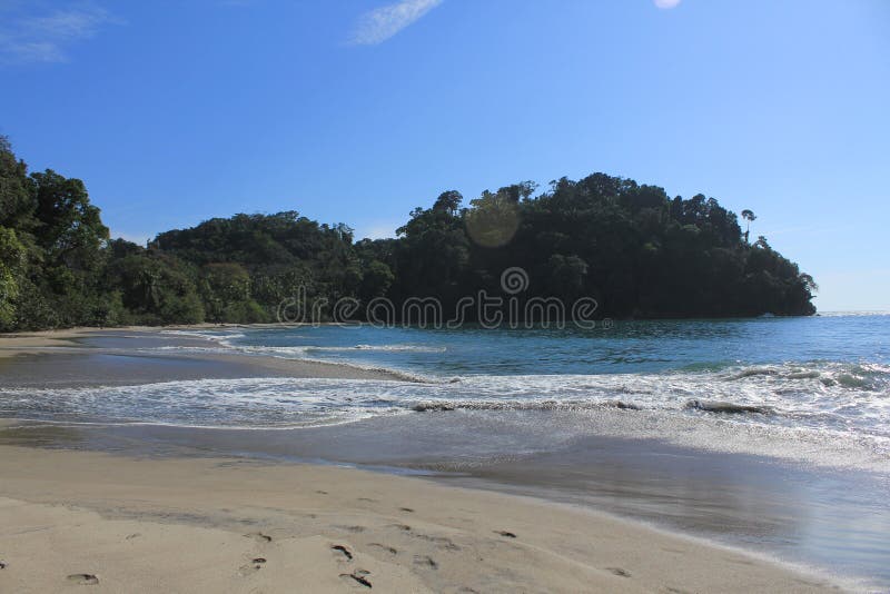 Sunny beach in Costa Rica stock image. Image of sunny 46190447
