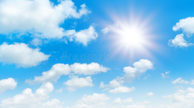 Sunny day background, blue sky with white cumulus clouds and glaring sun