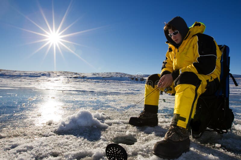 Sunny ice fishing stock image