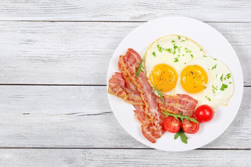 Sunny Side Up Eggs with bacon royalty free stock image Sunny Side Up Eggs with bacon royalty free stock image