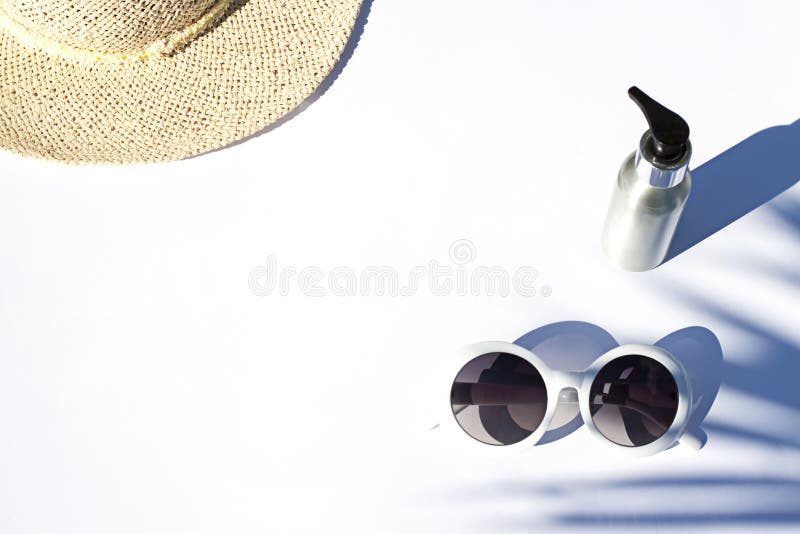 Sunny summer white cosmetics flat lay. Sunscreen concept. Top view beauty composition. stock photo