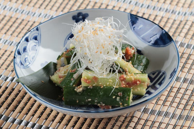 Sunomono Japanese cucumber salad including cut cucumber mixing with rice vinegar, sugar , salt and white sesame.