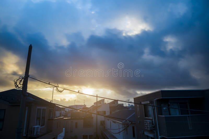 Sunray in the morning after thunder clouds break. Typhoon season. Summer