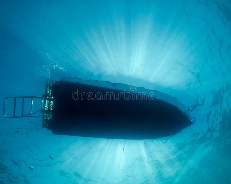 Sunrays над шлюпкой пикирования во Флориде стоковые изображения Sunrays над шлюпкой пикирования во Флориде стоковые изображения
