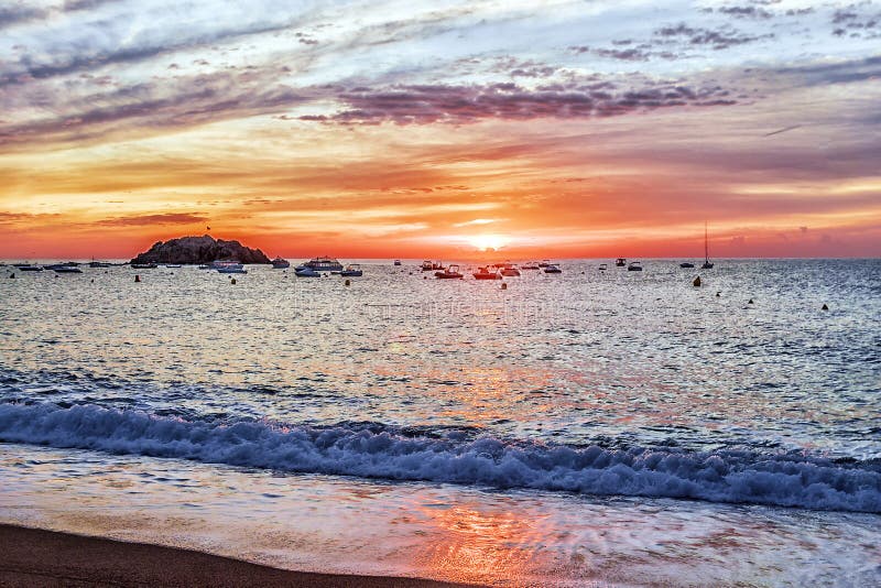 Sunrise on the coast of Tossa de Mar, Spain stock image Sunrise on the coast of Tossa de Mar, Spain stock image
