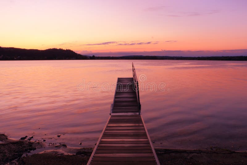 Sunrise by a lake inspiring relax and quietness