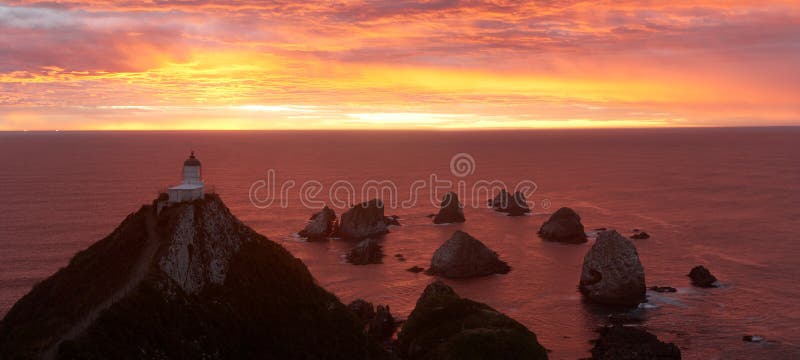 Sunrise on Nugget Point with Lighthouse