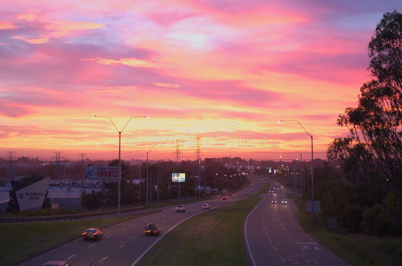 Colorful sunrise scenery Australian commuter traffic morning hour