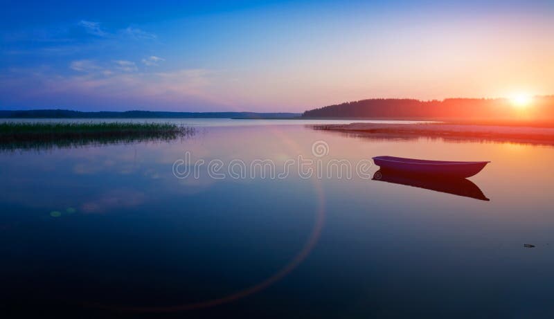 Sunrise over the lake stock photography