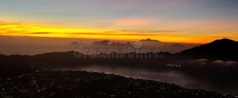 Sunrise over a lake inside a volcano royalty free stock images
