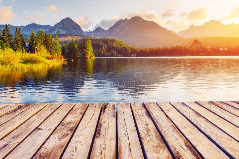 The sunrise over a lake in the park High Tatras.