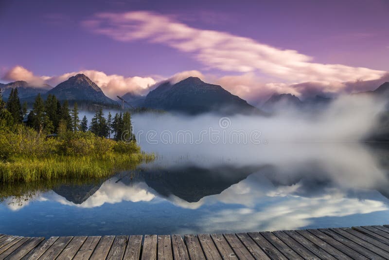 The sunrise over a lake in the park High Tatras