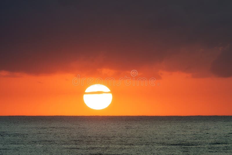 Sunrise over the ocean with orange sky and clouds, Gold Coast Australia stock photos Sunrise over the ocean with orange sky and clouds, Gold Coast Australia stock photos