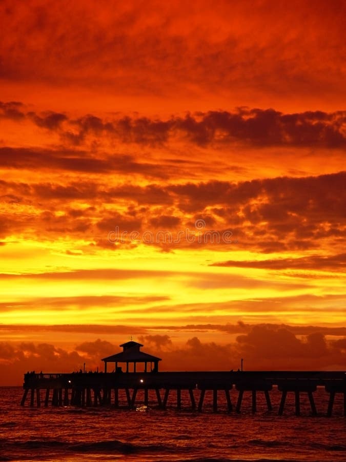 Sunrise with pier stock image