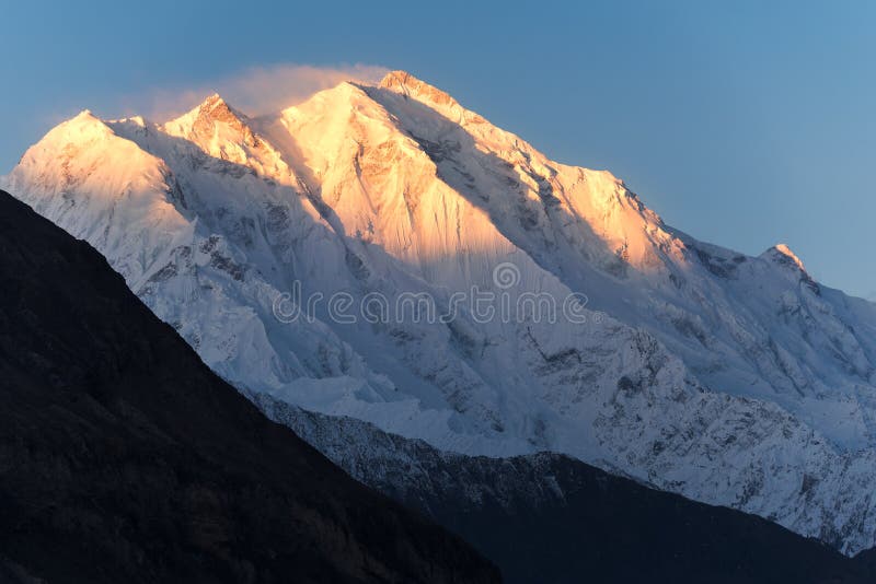 Sunrise in the Rakaposhi mountains peak in the Karakoram mountain range in Northern Pakistan