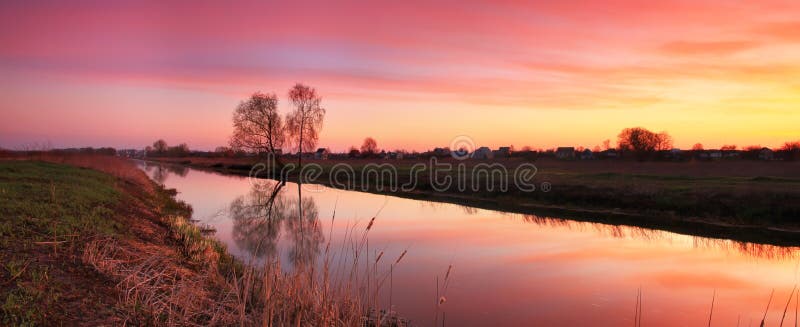 Sunrise on the river bank