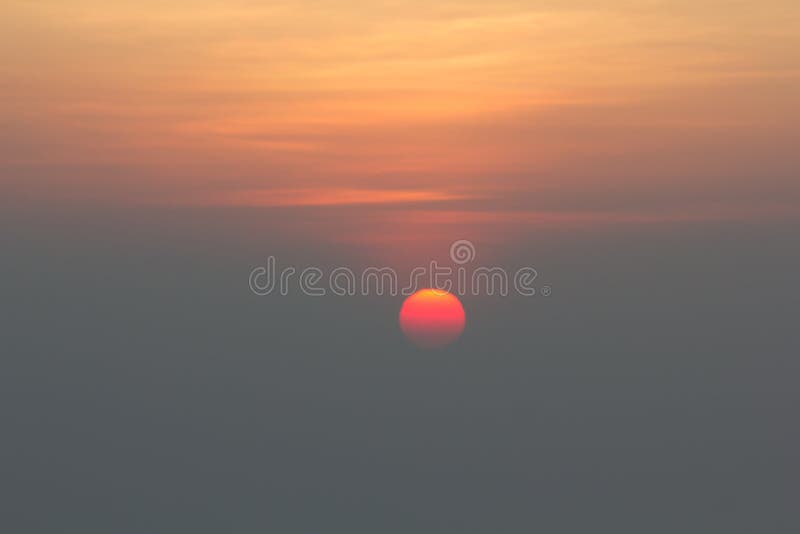 Sunrise Showing the Sun Behind Stock Photo Image of glowing, colored