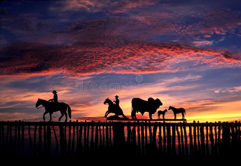 Sunrise and Texas ranch gate