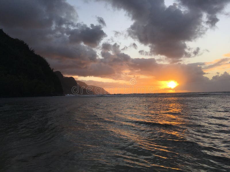 Sunset above Napali Coast - View from Ke`e Beach on Kauai Island in Hawaii.