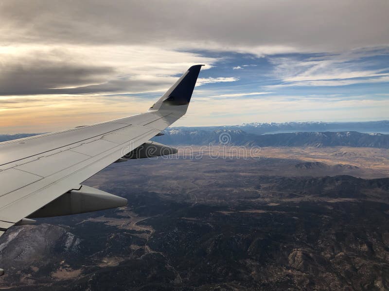 Sunset and airplane wing over Lake Tahoe and Reno. Aerial view of Lake Tahoe and Washoe Lake outside of Reno, Nevada stock photos Sunset and airplane wing over Lake Tahoe and Reno. Aerial view of Lake Tahoe and Washoe Lake outside of Reno, Nevada stock photos